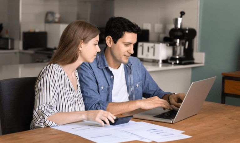 couple looking at bills